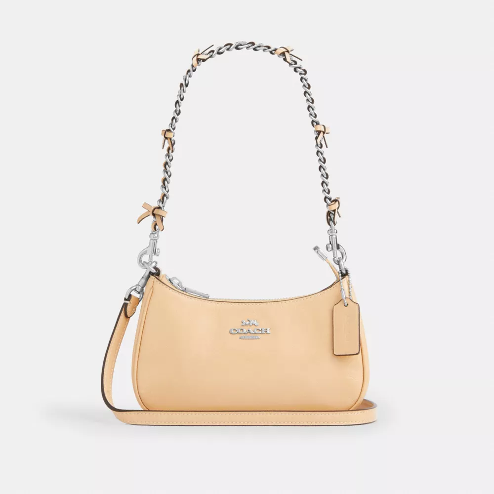 Teri Mini Crossbody Bag in Signature Canvas