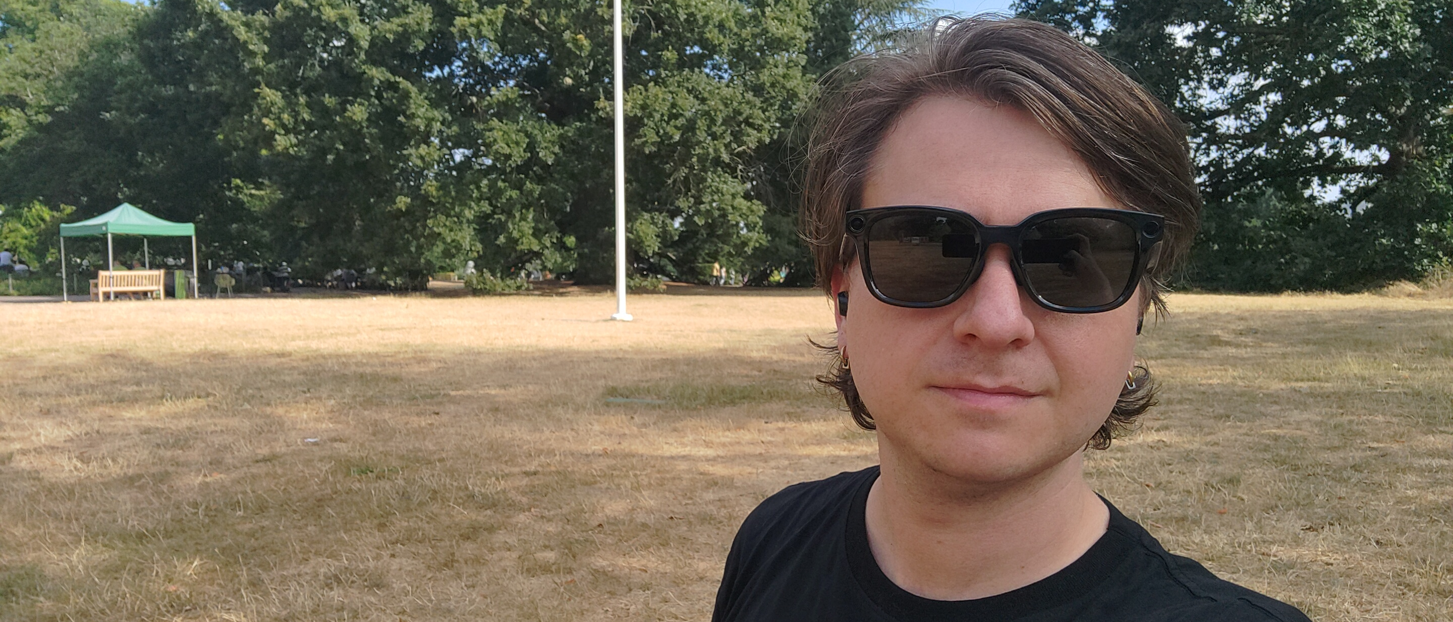 Photograph of a man wearing Rokid AI Glasses Style