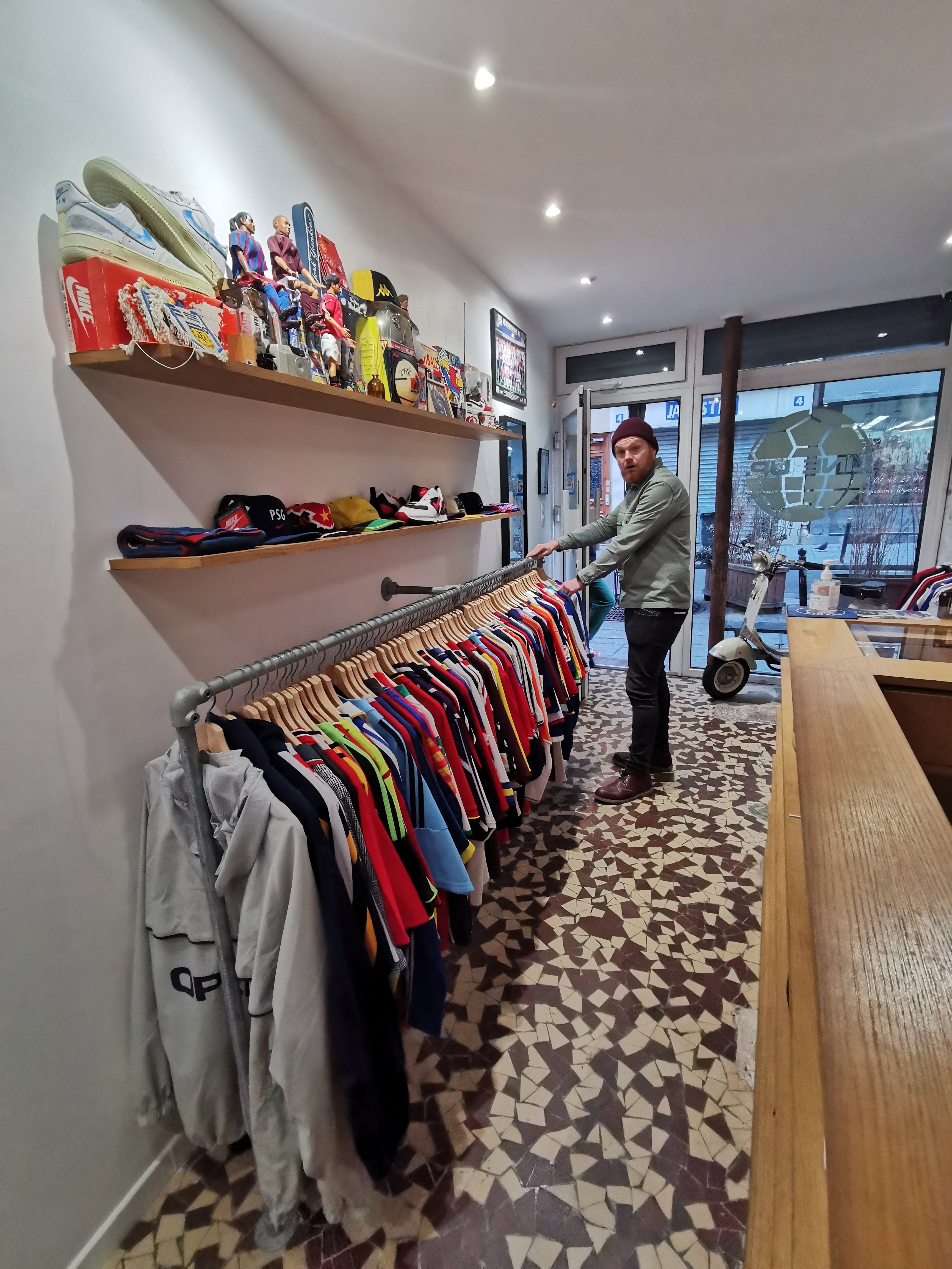 Matt Ketchell visiting LineUp a vintage football shirt shop in Paris