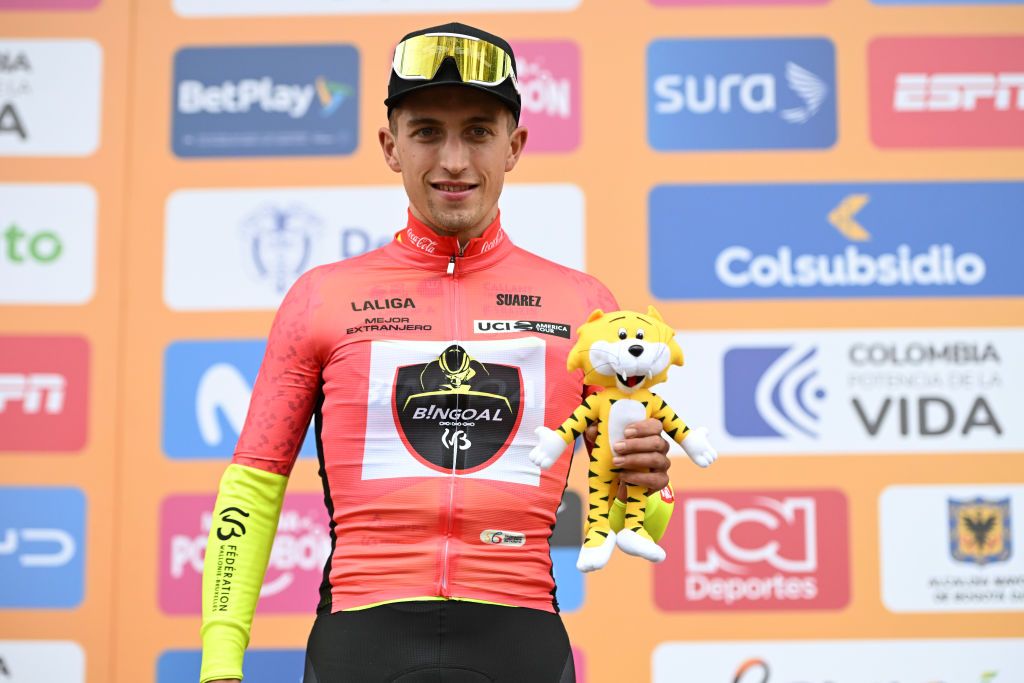PAIPA COLOMBIA FEBRUARY 06 Davide Persico of Italy and Team Bingoal WB celebrates at podium as Red Best Foreigner Jersey winner during the 4th Tour Colombia 2024 Stage 1 a 1686km stage from Paipa to Santa Rosa de Viterbo 2751m on February 06 2024 in Paipa Colombia Photo by Maximiliano BlancoGetty Images