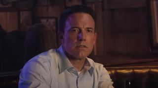 Ben Affleck's Christian Wolff studying a line dance in The Accountant 2