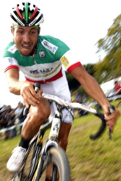Elia Silvestri (Selle Italia Guerciotti) uses some body english to get around a turn.