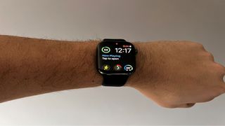 Image shows a turned on Apple Watch Series 7 on someone's wrist.
