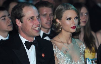 Prince William, Duke of Cambridge and Taylor Swift attend the Winter Whites Gala In Aid Of Centrepoint on November 26, 2013 in London, England