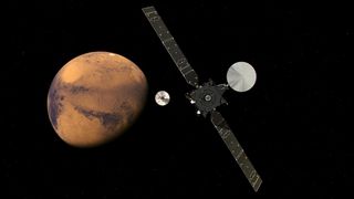 An artist's impression of the 2016 ExoMars mission approaching the planet. Credit: ESA