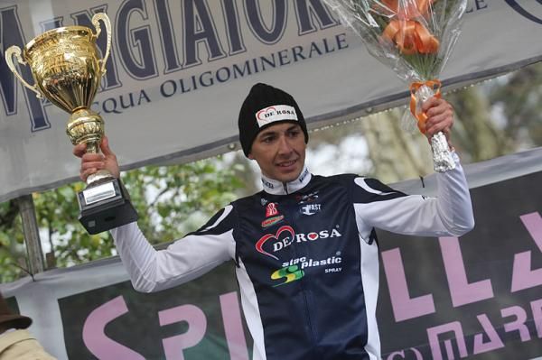 Matteo Montaguti on the podium after winning stage 1