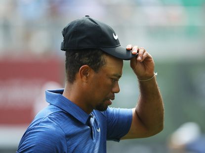 Tiger Woods' Comeback Halted After More Back Pains