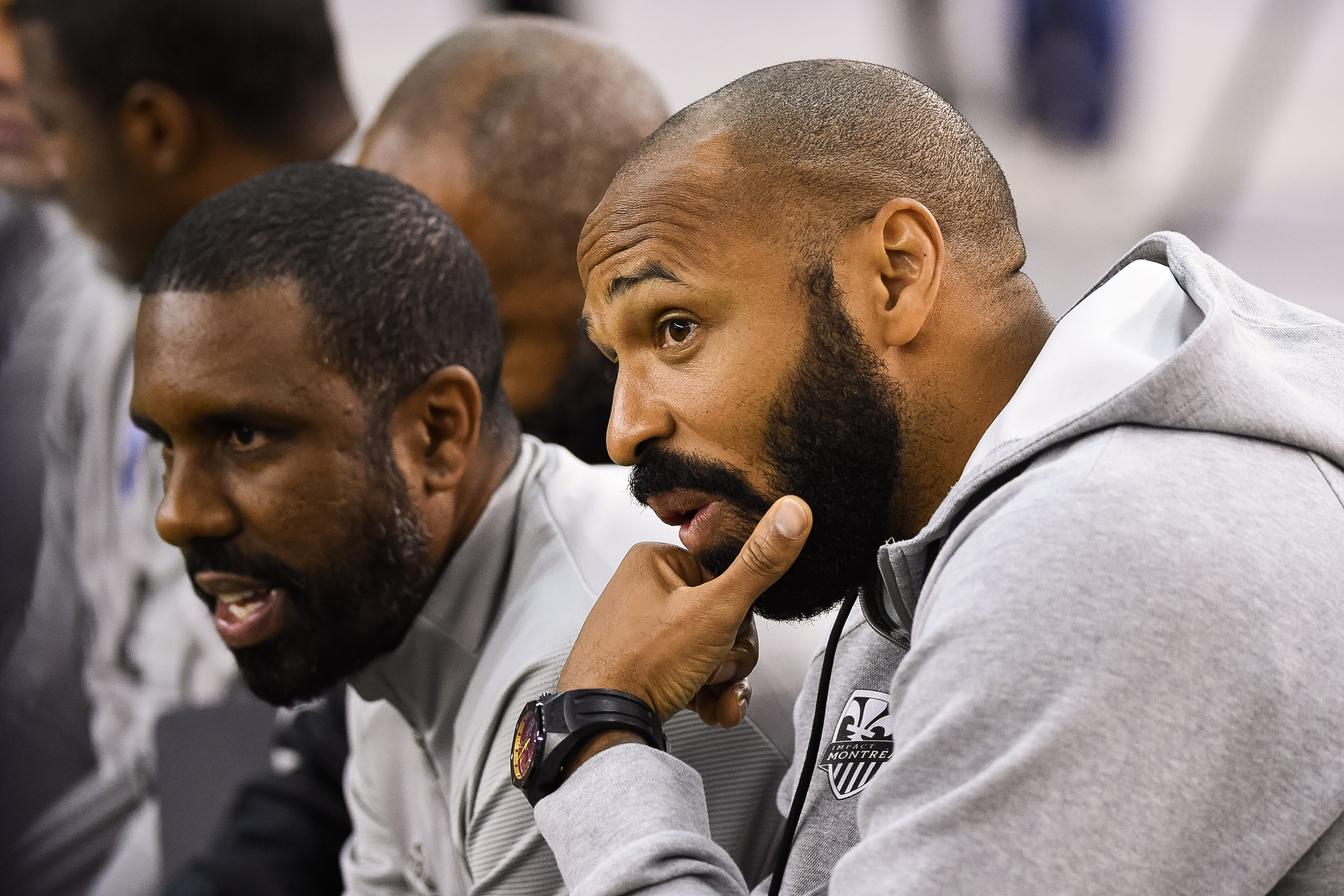 MONTREAL, QC - FEBRUARY 29: Montreal Impact head coach Thierry Henry discusses with one member of his coaching staff during the New England Revolution versus the Montreal Impact game on February 29, 2020, at Montreal Olympic Stadium in Montreal, QC (Photo by David Kirouac/Icon Sportswire)