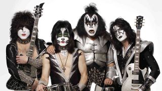 Kiss posing for a photograph in 2009