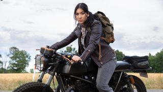 Maya Lopez stares into the camera while she sits on her motorbike in Marvel's Echo, the latest entry in our Marvel movies in order guide