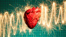 A graphic of a heart in front of an EKG
