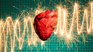 A graphic of a heart in front of an EKG