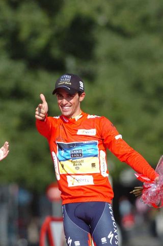 Alberto Contador salutes the crowd in Madrid having sealed his second Vuelta win