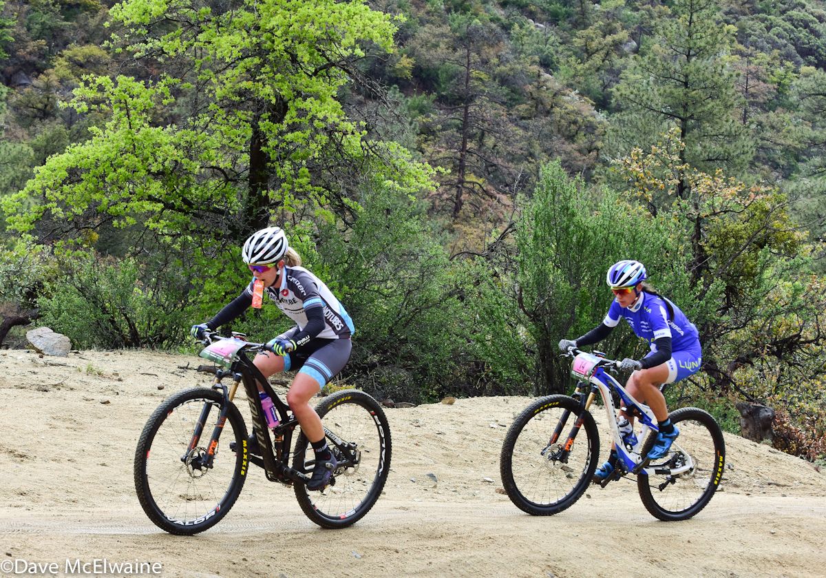 Chloe Woodruff (NoTubes Niner) climbing with Katerina Nash behind her