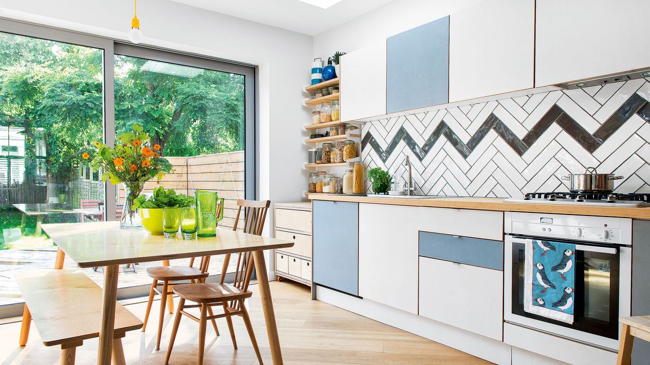 Kitchen with chevron tiled splashback tile layout pattens