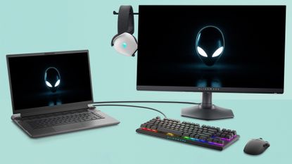 Alienware AW2724HF with accessories on green background