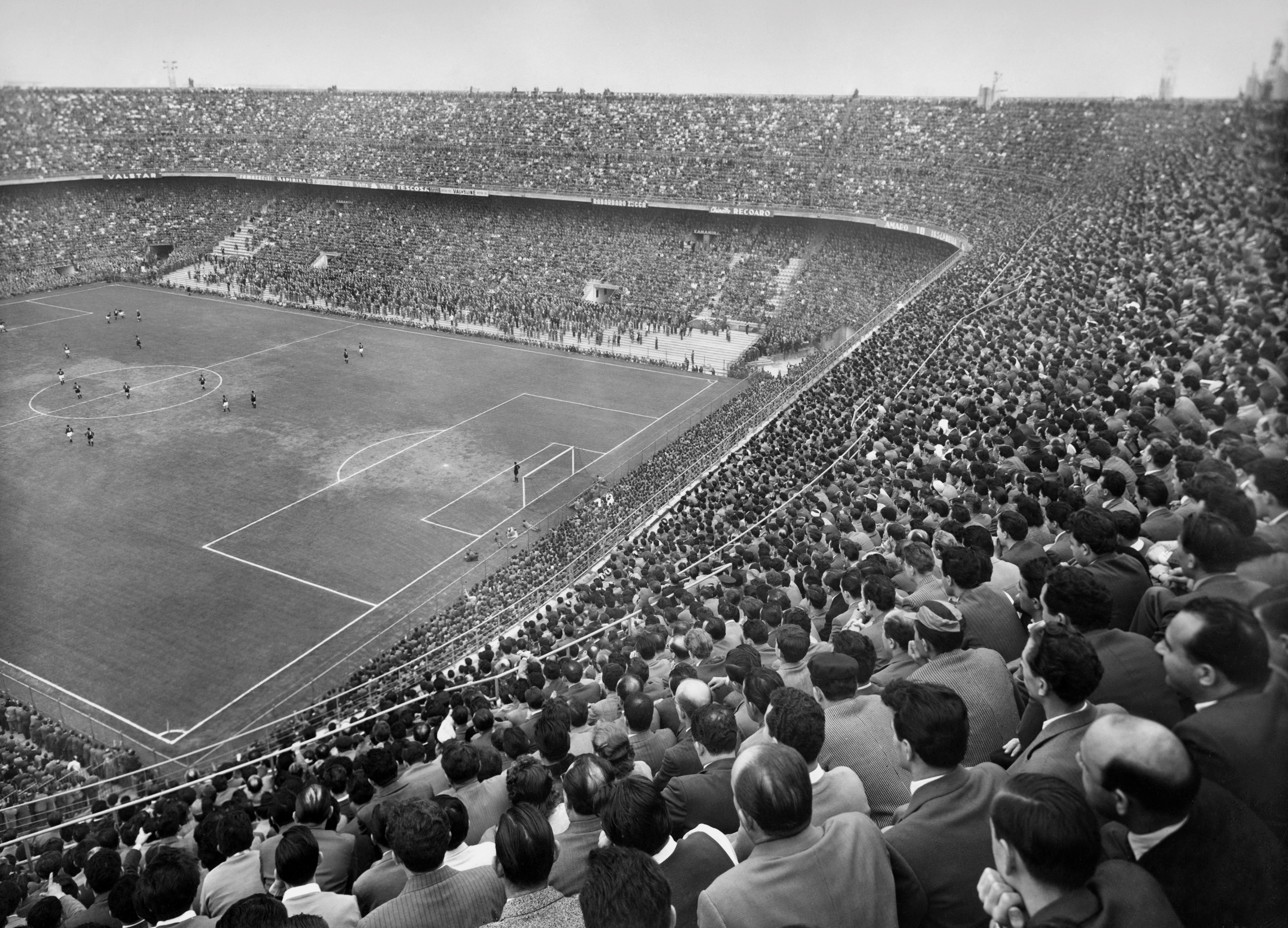 AC Milan and Inter in action in a derby at San Siro in the 1950s.