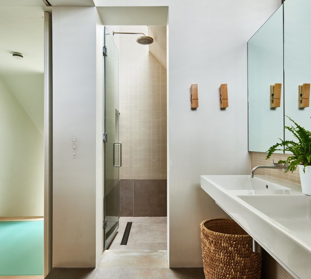 A walk-in shower room also connects the two rooms