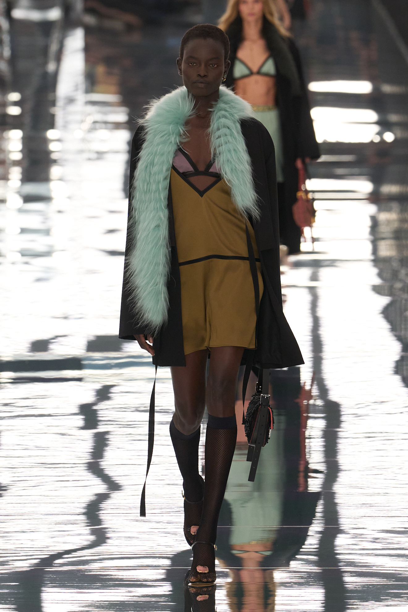 Photos of models walking down the runway at the Fendi Spring Summer 2027 show during Milan Fashion Week