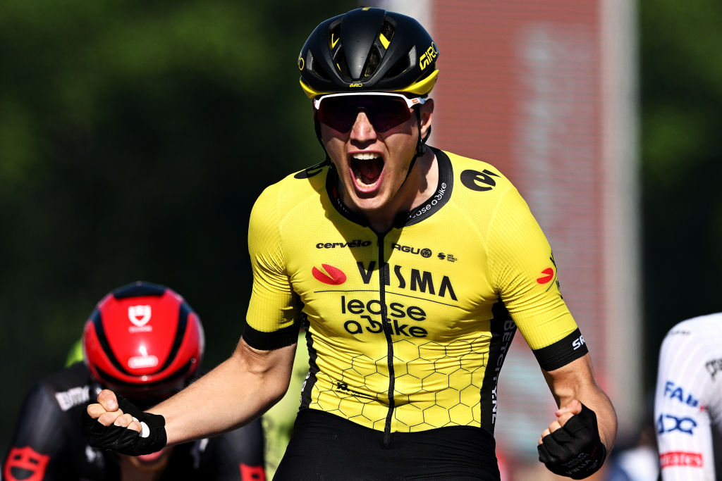 NAPLES ITALY MAY 12 EDITORS NOTE Alternate crop Olav Kooij of Netherlands and Team Visma Lease a Bike celebrates at finish line as stage winner during the 107th Giro dItalia 2024 Stage 9 a 214km stage from Avezzano to Naples UCIWT on May 12 2024 in Naples Italy Photo by Tim de WaeleGetty Images