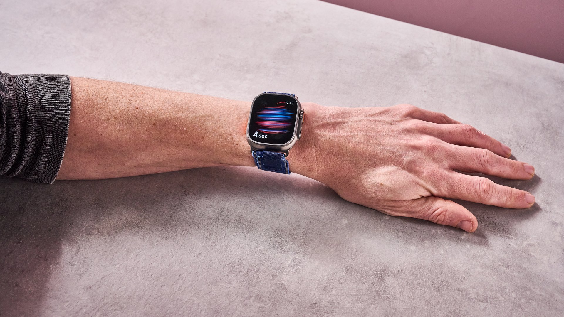 The Apple Watch Ultra 2 on a man's wrist, showing the blood oxygen tracking feature in action.