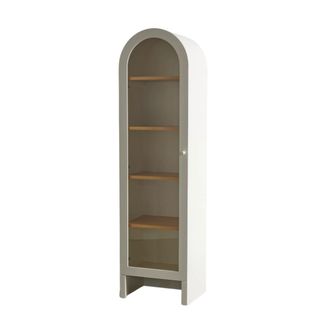 The Mason Curio Cabinet in white from Urban Outfitters with four shelves and a door