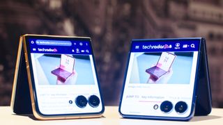 Samsung Galaxy Z Flip 7 in blue next to a Moto Razr Ultra botrh showing TechRadar.com on the cover display