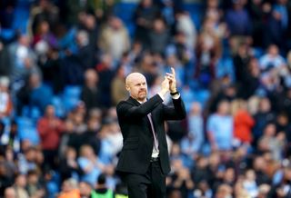 Burnley manager Sean Dyche applauds the fans at the Etihad