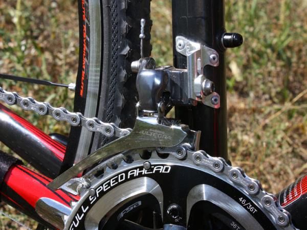 Scott foregoes the carbon front derailleur mount on the road-going Addict for a stouter aluminum bit on the CX