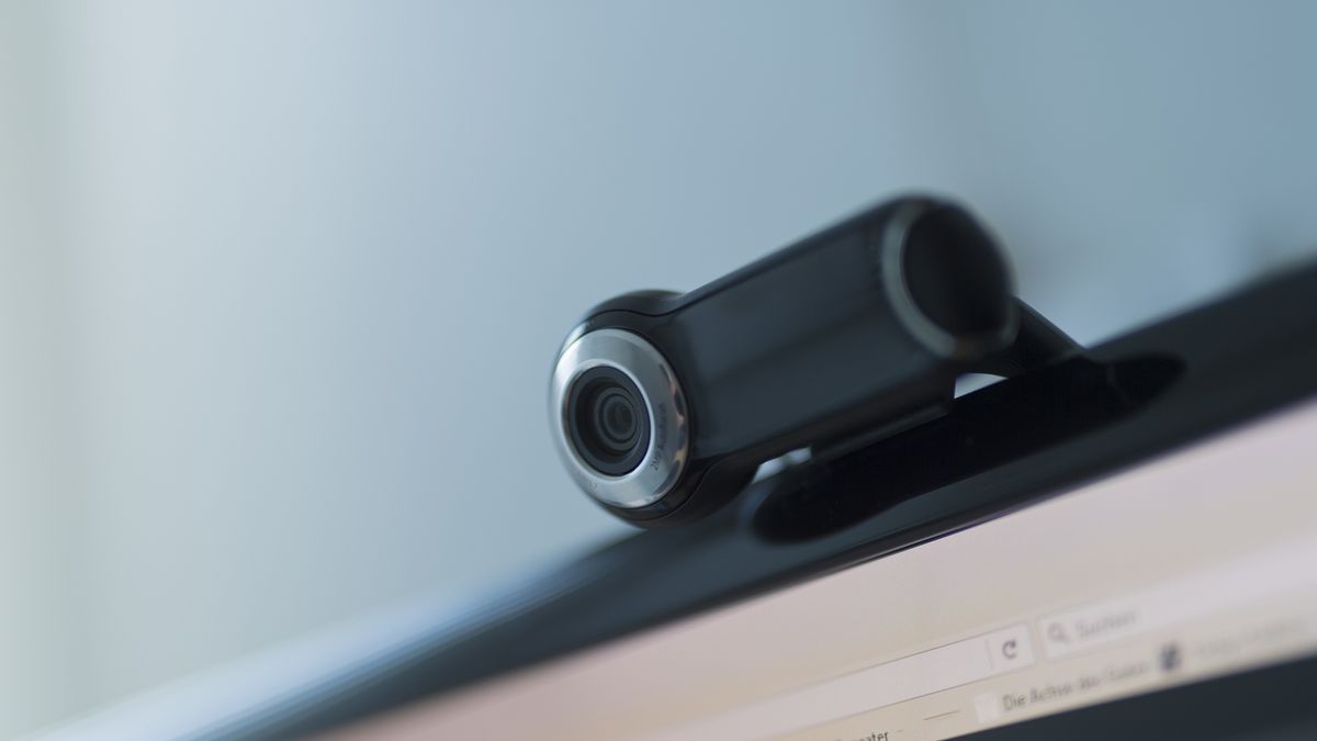 An external webcam on top of a monitor