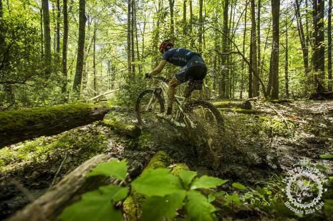 Cole Oberman blasts through a muddy section bef ore hitting a rock garden