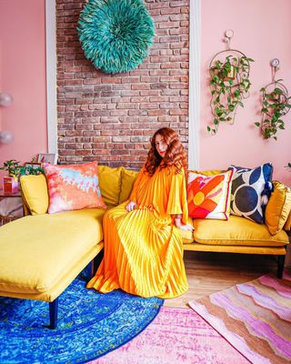 Yellow couch in a colorful living room