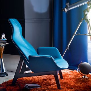 blue moulded armchair stargazer and textured rug