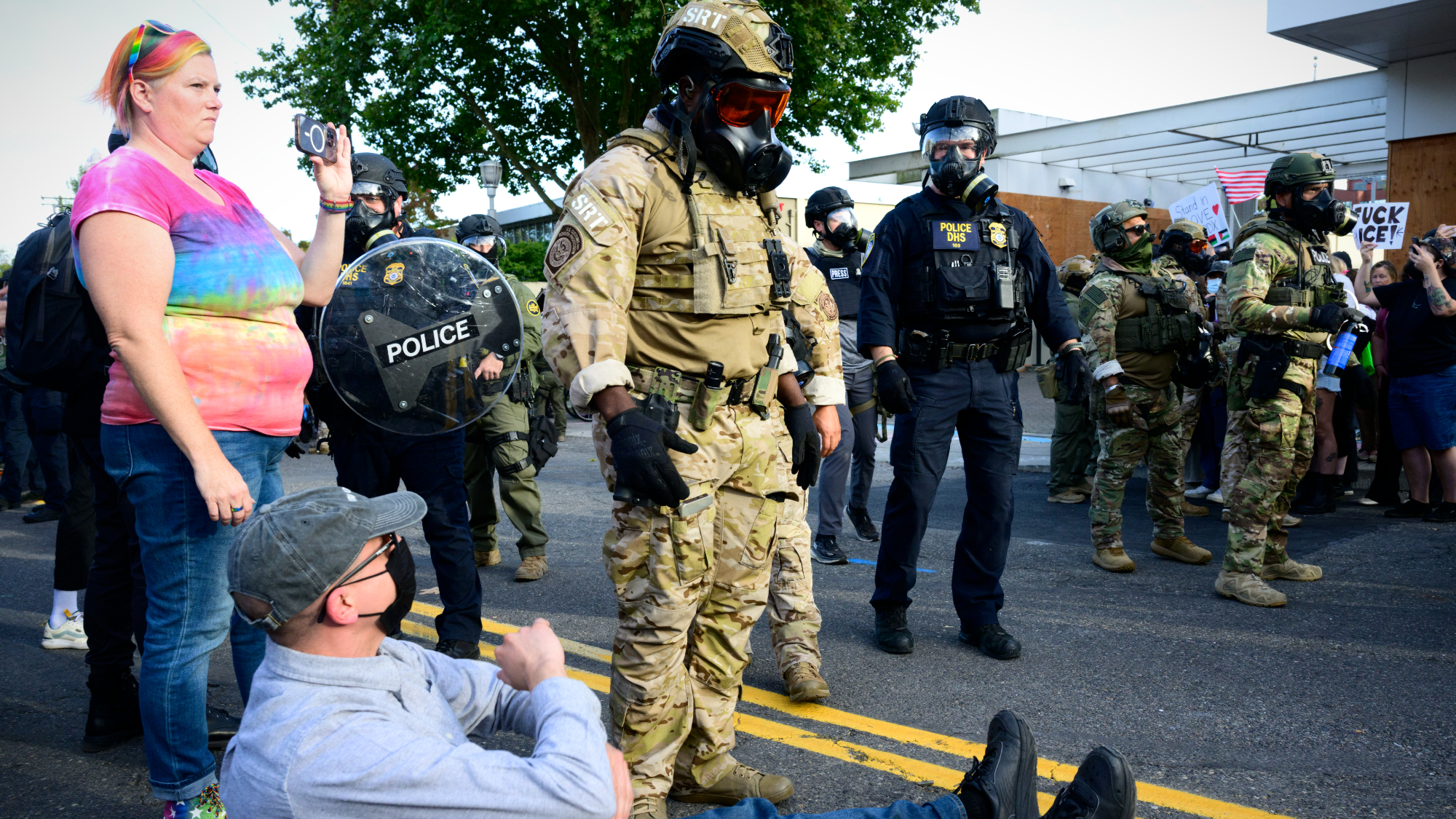 Federal agents confront protesters outside ICE facility in Portland, Oregon