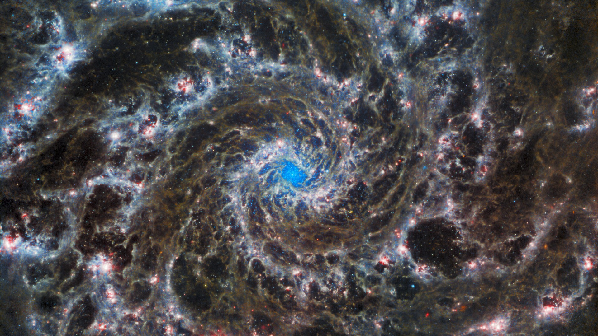 The James Webb Space Telescope's view of the heart of the Phantom Galaxy (M74). It is in a spiral pattern.