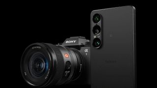 A Sony Alpha 1 camera with a lens alongside a sleek Sony Xperia 1 VII, both set against a black background