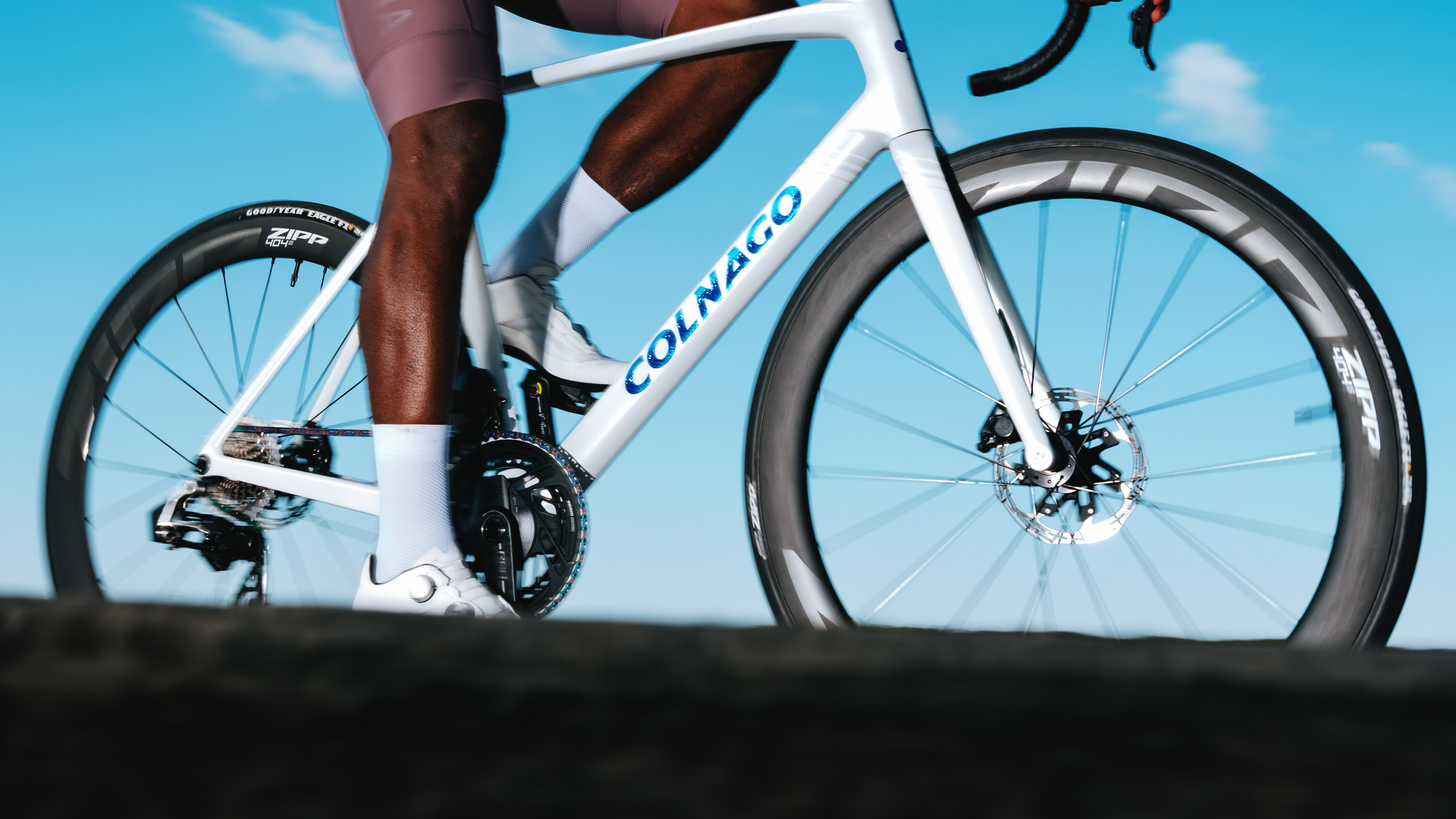 A white colnago with zipp wheels