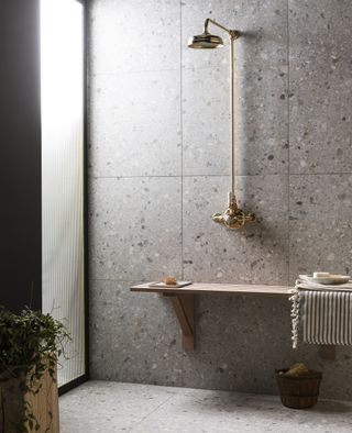 shower storage ideas wall hung bench in terrazzo bathroom by Mandarin Stone