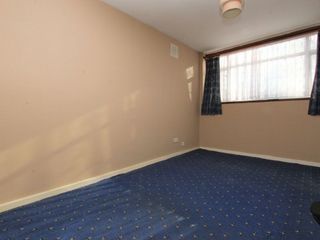 Before image of yellow bedroom