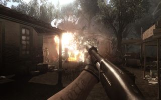 Aiming down sights in Far Cry 2 as building explodes into pieces