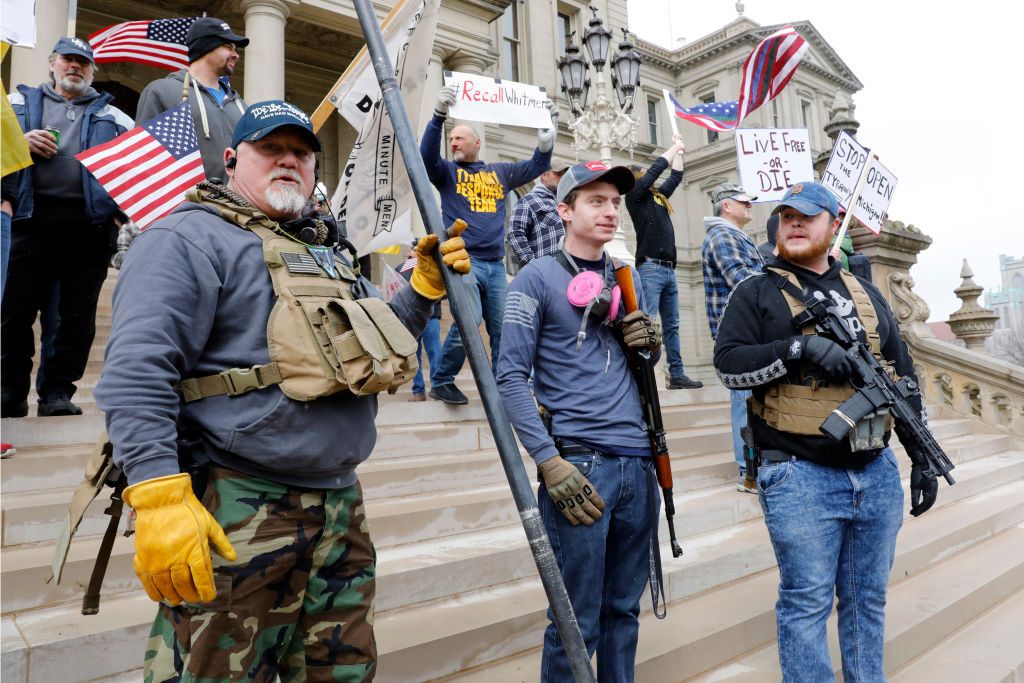 Protesters outside Michigan&amp;#039;s statehouse.