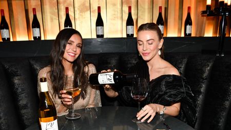 nina dobrev and julianne hough drinking wine