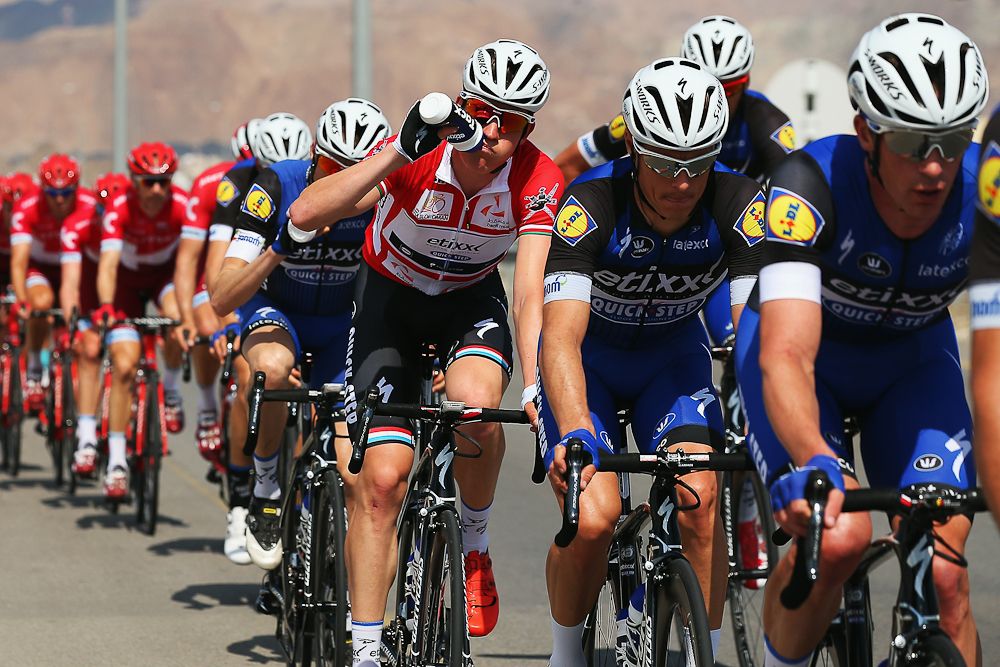 Race leader Bob jungels takes a drink during stage 2 in Oman.