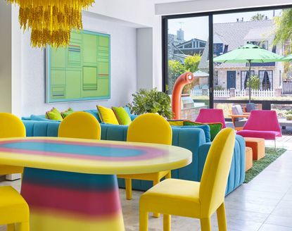 yellow, pink and blue living room