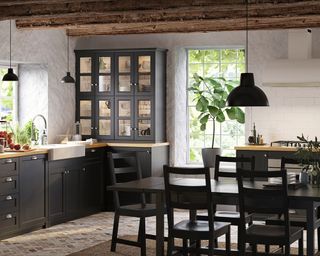 Ikea black kitchen with black dining table and chairs