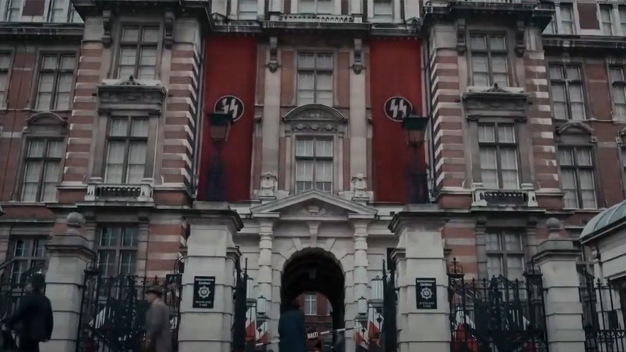The exterior of a building with SS banners on it in SS-GB