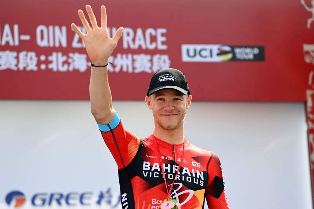 QINZHOU CHINA OCTOBER 13 Jonathan Milan of Italy and Team Bahrain Victorious celebrates at podium as stage winner during the 4th GreeTour of Guangxi 2023 Stage 2 a 1496km stage from Beihai to Qinzhou UCIWT on October 13 2023 in Qinzhou China Photo by Tim de WaeleGetty Images