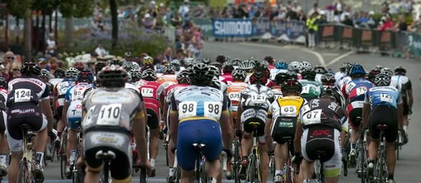 The peloton head out of the home straight in Buninyong before entering the Midland Highway.