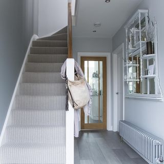 hallway stairs with white walls