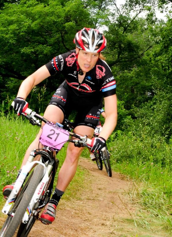 Katie Compton (Planet Bike) descending.